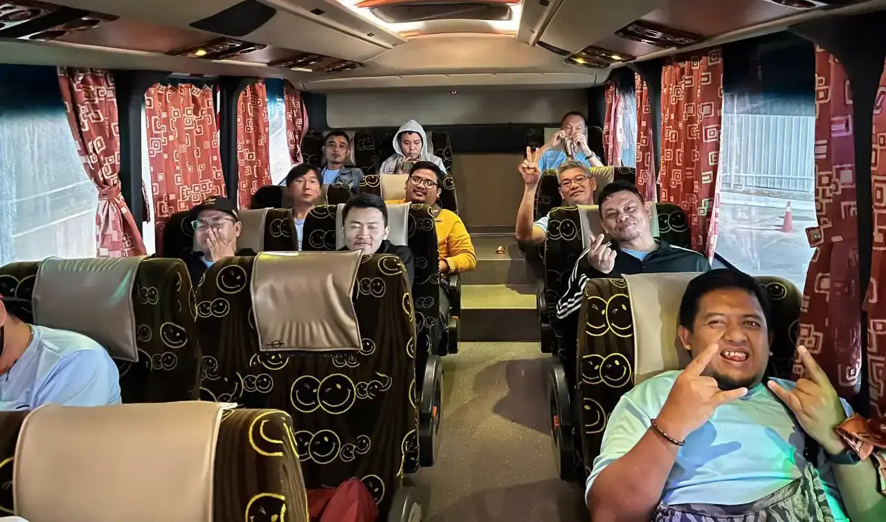 Ichiplas team having fun in the bus during the trip to Malacca
