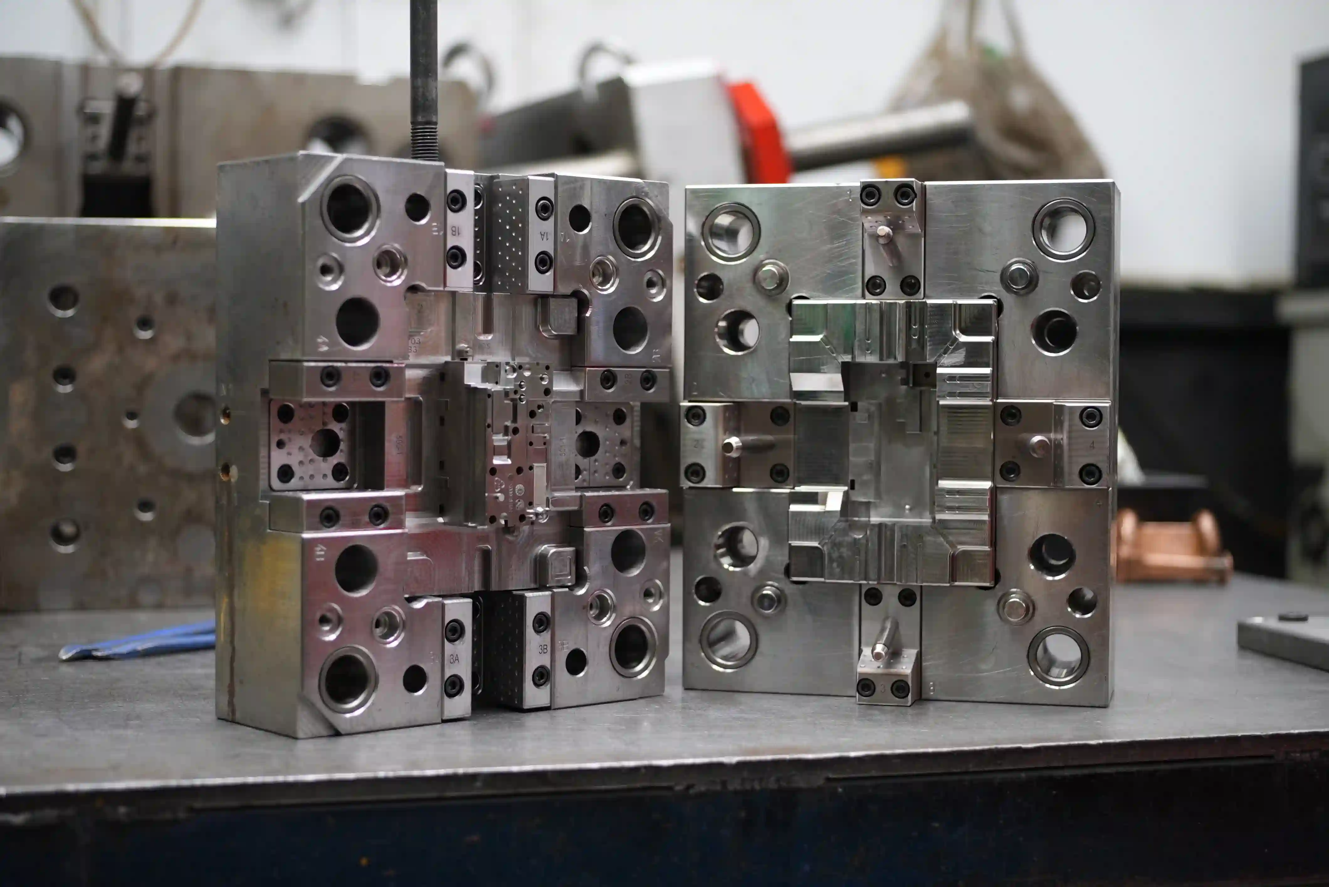 Sample injection mold tool with cavity and core halves